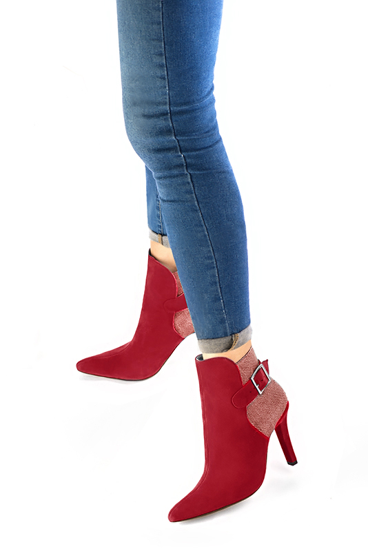 Cardinal red women's ankle boots with buckles at the back. Tapered toe. Very high slim heel. Worn view - Florence KOOIJMAN